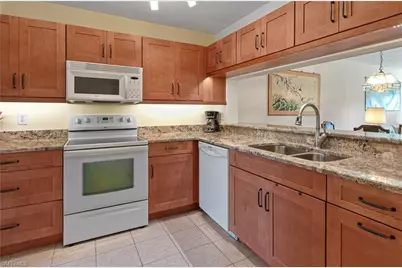 1208 Commonwealth Cir #J103, Naples, FL 34116 - Photo 15