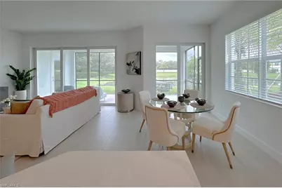 16881 Fairgrove Way #7-102, Naples, FL 34110 - Photo 9