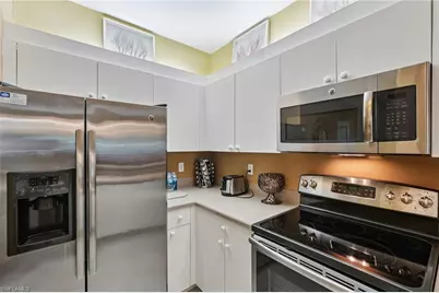 7709 Pebble Creek Cir #202, Naples, FL 34108 - Photo 9