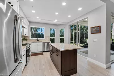 25040 Cypress Hollow Ct #104, Bonita Springs, FL 34134 - Photo 9