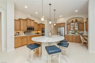 12902 Pond Apple Dr W, Naples, FL 34119 - Photo 11