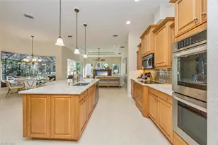 12902 Pond Apple Dr W, Naples, FL 34119 - Photo 13