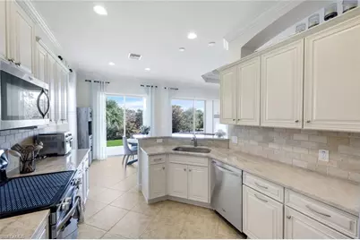 9550 Ironstone Ter #201, Naples, FL 34120 - Photo 11