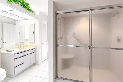 11730 Quail Village Way #103-1, Naples, FL 34119 - Photo 9