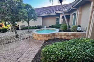 11730 Quail Village Way, Naples, FL 34119 - Photo 5