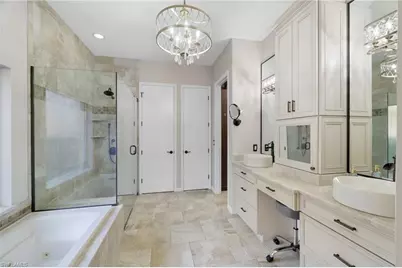 10071 St Moritz Dr, Miromar Lakes, FL 33913 - Photo 13