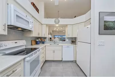 501 Lake Louise Cir #204, Naples, FL 34110 - Photo 5