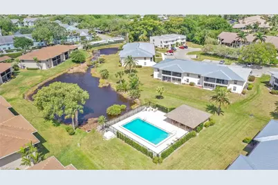 151 Cypress Way E #C103, Naples, FL 34110 - Photo 1