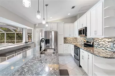 1061 15th St SW, Naples, FL 34117 - Photo 9