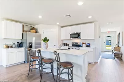 14176 Hemingway Oaks Trl, Fort Myers, FL 33905 - Photo 9