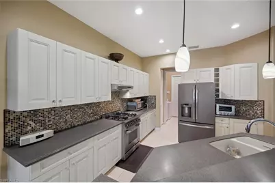 10748 Fieldfair Dr, Naples, FL 34119 - Photo 11