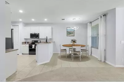 1370 Mariposa Cir #102, Naples, FL 34105 - Photo 15