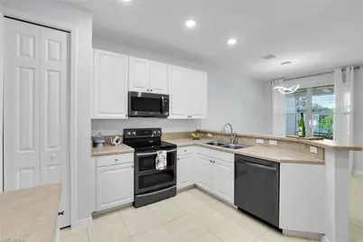 1370 Mariposa Cir #102, Naples, FL 34105 - Photo 11