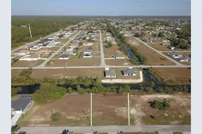 825 NE 32nd Ter, Cape Coral, FL 33909 - Photo 3