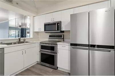 9610 Victoria Ln #D202, Naples, FL 34109 - Photo 5