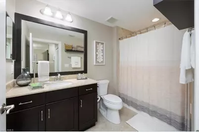 15114 Palmer Lake Cir #104, Naples, FL 34109 - Photo 11