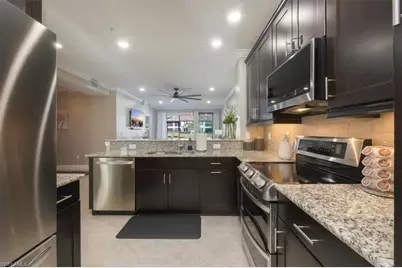 15114 Palmer Lake Cir #104, Naples, FL 34109 - Photo 1