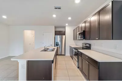 15319 Wildflower Cir, Naples, FL 34119 - Photo 5