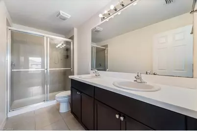 15319 Wildflower Cir, Naples, FL 34119 - Photo 7