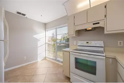 10623 Arlingford Blvd, Lehigh Acres, FL 33936 - Photo 13