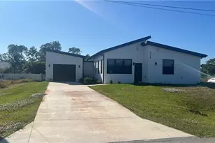 714 Chambers St E, Lehigh Acres, FL 33974 - Photo 1