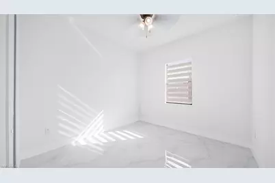 1256 Edmund St E, Lehigh Acres, FL 33974 - Photo 21