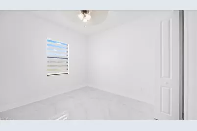 1256 Edmund St E, Lehigh Acres, FL 33974 - Photo 25