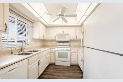 5635 Rattlesnake Hammock Rd #D-203, Naples, FL 34113 - Photo 1