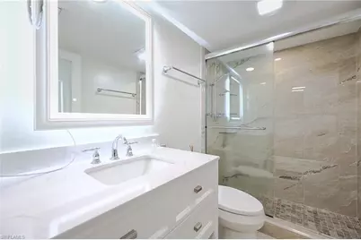 3055 Riviera Dr #306, Naples, FL 34103 - Photo 15