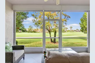 725 Saratoga Cir #A101, Naples, FL 34104 - Photo 1