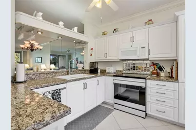 725 Saratoga Cir #A101, Naples, FL 34104 - Photo 9