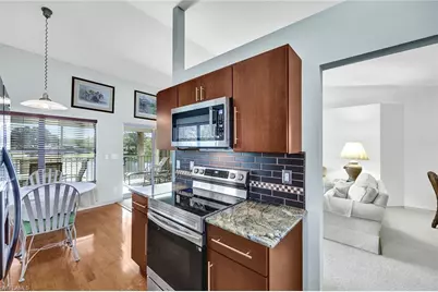 24766 Lakemont Cove Ln #201, Bonita Springs, FL 34134 - Photo 11