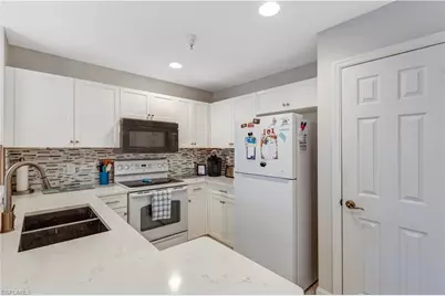 4530 Botanical Place Cir #206, Naples, FL 34112 - Photo 9