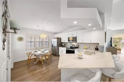 2450 Old Groves Rd #201, Naples, FL 34109 - Photo 9