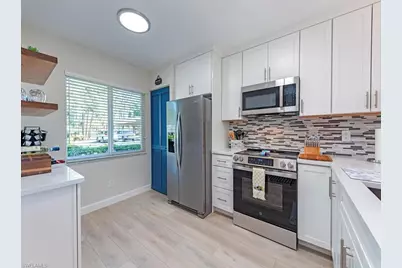 5950 Amherst Dr #A106, Naples, FL 34112 - Photo 1