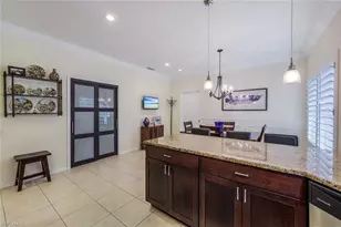 11686 Quail Village Way, Naples, FL 34119 - Photo 11
