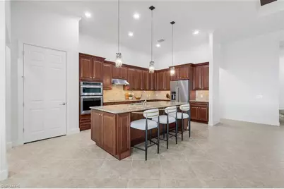 9305 Quarry Dr, Naples, FL 34120 - Photo 11
