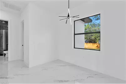 3418 8th St SW, Lehigh Acres, FL 33976 - Photo 9