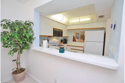 113 Wading Bird Cir #W-102, Naples, FL 34110 - Photo 5