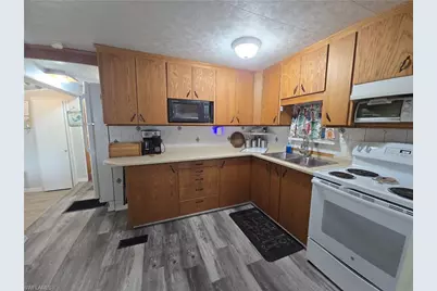 23 Enchanting Blvd #E23, Naples, FL 34112 - Photo 9