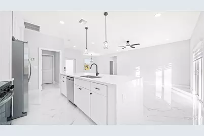 311 Mangonia Ave, Lehigh Acres, FL 33974 - Photo 7