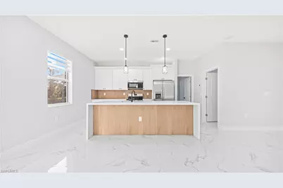 915 Mayfield Ave S, Lehigh Acres, FL 33974 - Photo 3