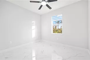 915 Mayfield Ave S, Lehigh Acres, FL 33974 - Photo 13