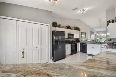 9165 Michael Cir #1002, Naples, FL 34113 - Photo 3