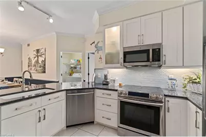 2110 Cay Lagoon Dr #113, Naples, FL 34109 - Photo 15