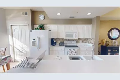 2730 Cypress Trace Cir #2828, Naples, FL 34119 - Photo 19