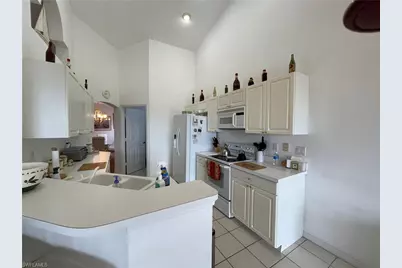 25232 Pelican Creek Cir #202, Bonita Springs, FL 34134 - Photo 9