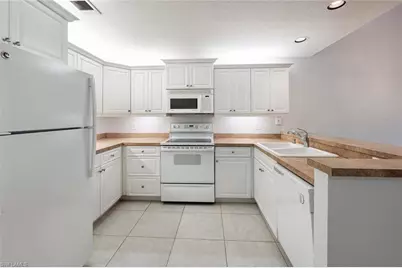 60 Emerald Woods Dr #B 5, Naples, FL 34108 - Photo 11