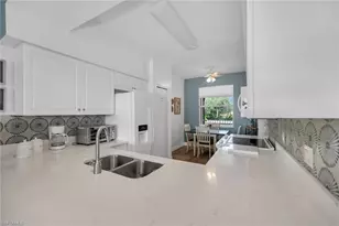 2740 Cypress Trace Cir, Naples, FL 34119 - Photo 13