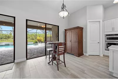 7716 Winding Cypress Dr, Naples, FL 34114 - Photo 13